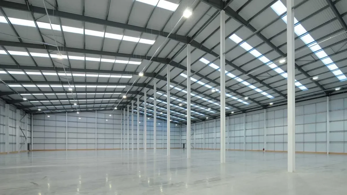 Large steel warehouse with clear span interior